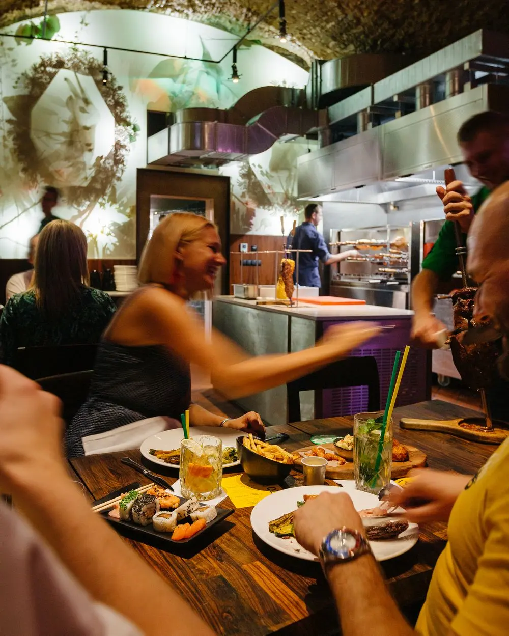 Meat served by passador at Brasileiro restaurant.